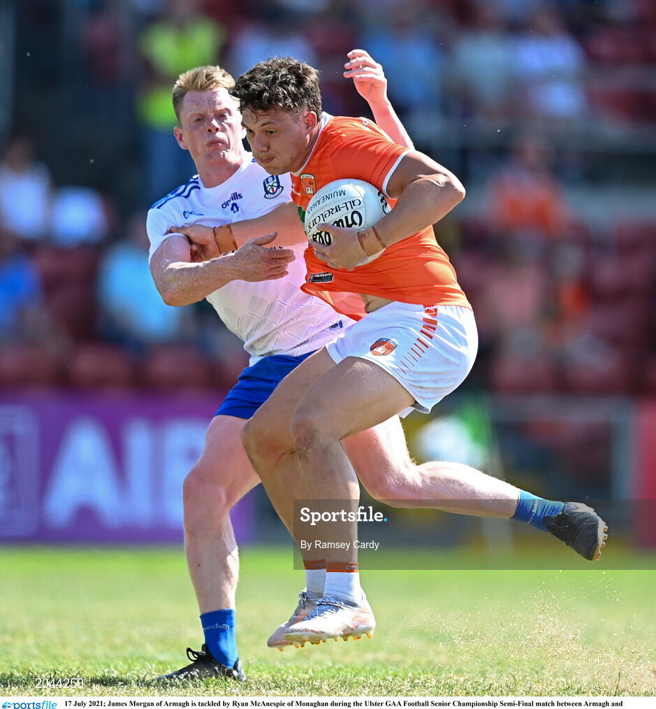 17 July 2021; James Morgan of Armagh is tackled by Ryan McAnespie of Monaghan during the Ulster GAA Football Senior Championship Semi-Final match between Armagh and Monaghan at Páirc Esler in Newry, Down. Photo by Ramsey Cardy/Sportsfile