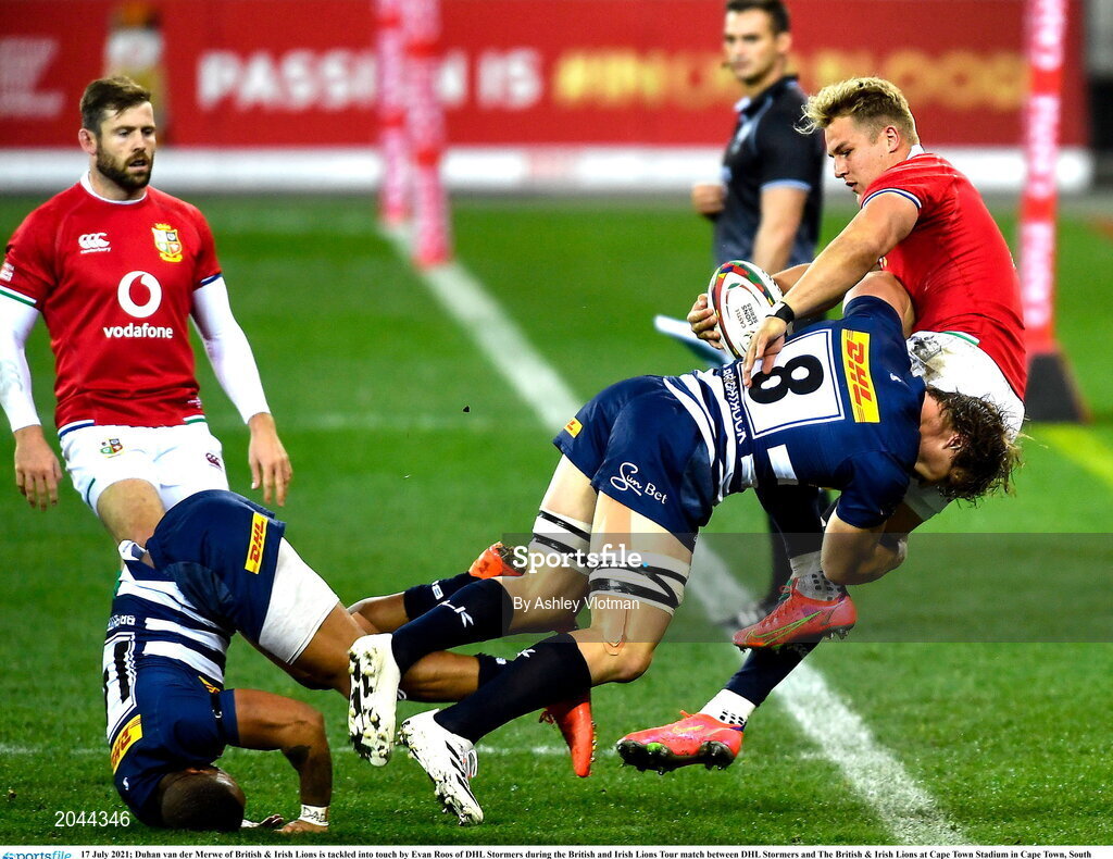 17 July 2021; Duhan van der Merwe of British & Irish Lions is tackled into touch by Evan Roos of DHL Stormers during the British and Irish Lions Tour match between DHL Stormers and The British & Irish Lions at Cape Town Stadium in Cape Town, South Africa. Photo by Ashley Vlotman/Sportsfile