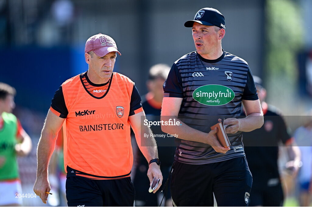 17 July 2021; Armagh manager Kieran McGeeney, left, and Kieran Donaghy during the Ulster GAA Football Senior Championship Semi-Final match between Armagh and Monaghan at Páirc Esler in Newry, Down. Photo by Ramsey Cardy/Sportsfile