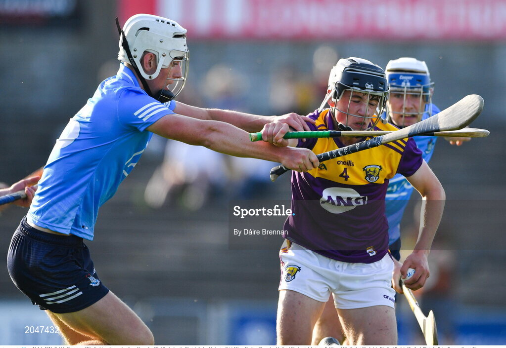 21 July 2021; Robbie Chapman of Wexford in action against Leon Kennedy of Dublin during the Electric Ireland Leinster GAA Minor Hurling Championship Semi-Final match between Dublin and Wexford at Chadwicks Wexford Park in Wexford. Photo by Daire Brennan/Sportsfile