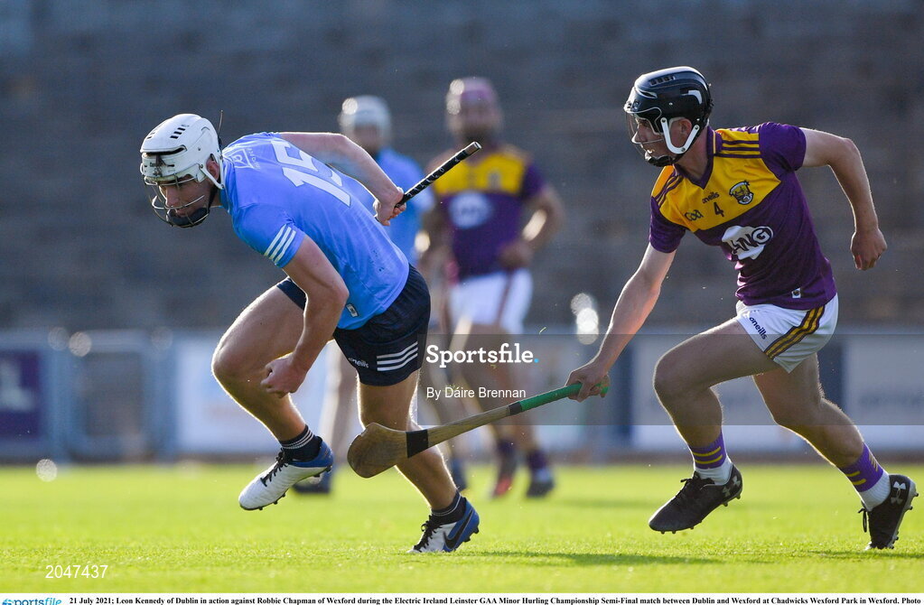 21 July 2021; Leon Kennedy of Dublin in action against Robbie Chapman of Wexford during the Electric Ireland Leinster GAA Minor Hurling Championship Semi-Final match between Dublin and Wexford at Chadwicks Wexford Park in Wexford. Photo by Daire Brennan/Sportsfile