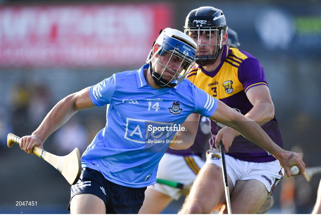 21 July 2021; Callum Walsh of Dublin in action against Eoin Whelan of Wexford during the Electric Ireland Leinster GAA Minor Hurling Championship Semi-Final match between Dublin and Wexford at Chadwicks Wexford Park in Wexford. Photo by Daire Brennan/Sportsfile