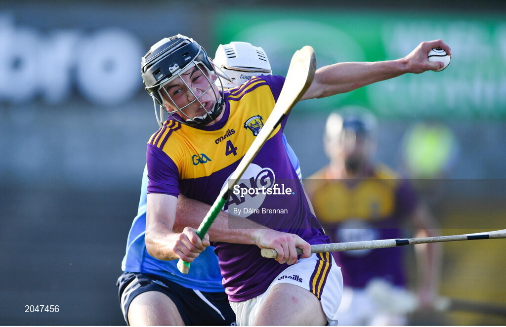21 July 2021; Robbie Chapman of Wexford in action against Conn Rock of Dublin during the Electric Ireland Leinster GAA Minor Hurling Championship Semi-Final match between Dublin and Wexford at Chadwicks Wexford Park in Wexford. Photo by Daire Brennan/Sportsfile