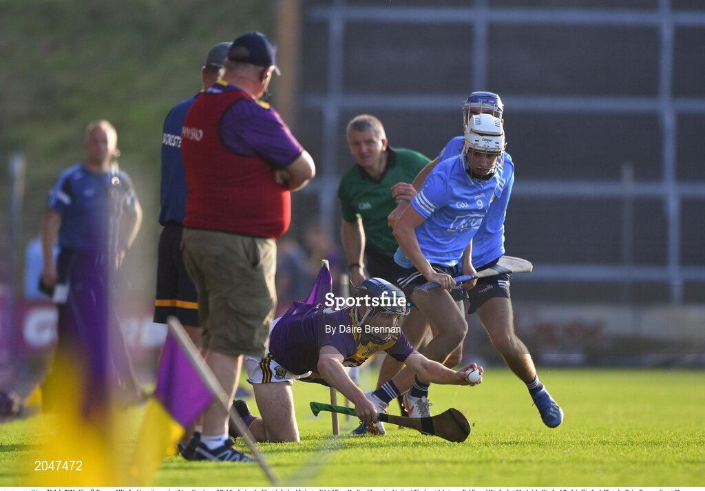 21 July 2021; Cian Ó Tuama of Wexford in action against Liam Garrigan of Dublin during the Electric Ireland Leinster GAA Minor Hurling Championship Semi-Final match between Dublin and Wexford at Chadwicks Wexford Park in Wexford. Photo by Daire Brennan/Sportsfile