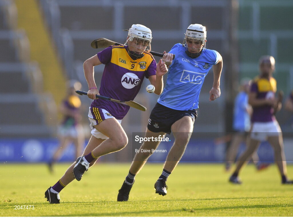21 July 2021; Cillian Byrne of Wexford in action against David Lucey of Dublin during the Electric Ireland Leinster GAA Minor Hurling Championship Semi-Final match between Dublin and Wexford at Chadwicks Wexford Park in Wexford. Photo by Daire Brennan/Sportsfile
