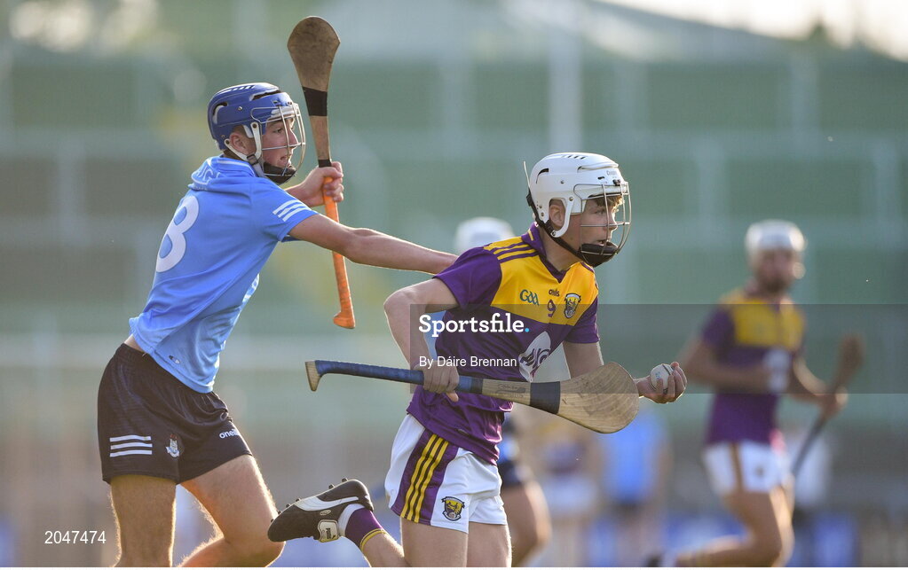21 July 2021; Cillian Byrne of Wexford in action against Ben Gaughran of Dublin during the Electric Ireland Leinster GAA Minor Hurling Championship Semi-Final match between Dublin and Wexford at Chadwicks Wexford Park in Wexford. Photo by Daire Brennan/Sportsfile