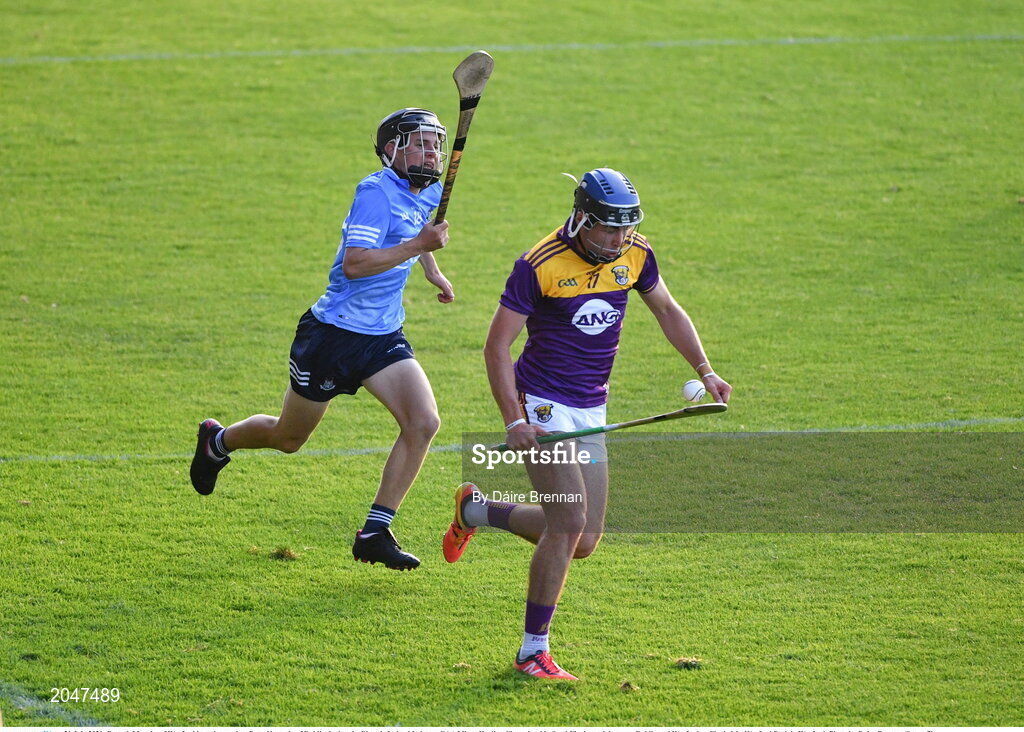 21 July 2021; Daragh Murphy of Wexford in action against Dara Kennedy of Dublin during the Electric Ireland Leinster GAA Minor Hurling Championship Semi-Final match between Dublin and Wexford at Chadwicks Wexford Park in Wexford. Photo by Daire Brennan/Sportsfile