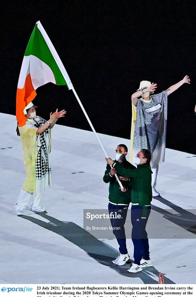 23 July 2021; Team Ireland flagbearers Kellie Harrington and Brendan Irvine carry the Irish tricolour during the 2020 Tokyo Summer Olympic Games opening ceremony at the Olympic Stadium in Tokyo, Japan. Photo by Brendan Moran/Sportsfile