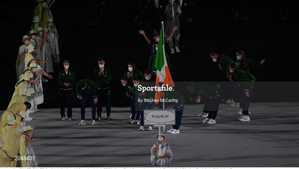 23 July 2021; 23 July 2021; Team Ireland athletes bow to their Japanese hosts during the 2020 Tokyo Summer Olympic Games opening ceremony at the Olympic Stadium in Tokyo, Japan. Photo by Stephen McCarthy/Sportsfile