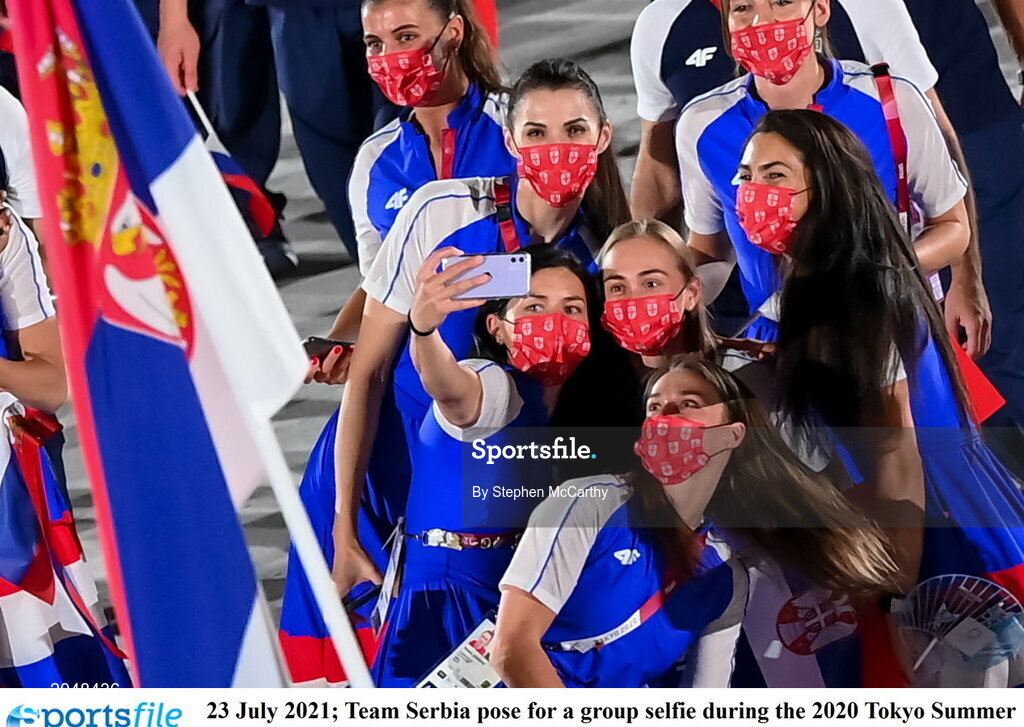 23 July 2021; Team Serbia pose for a group selfie during the 2020 Tokyo Summer Olympic Games opening ceremony at the Olympic Stadium in Tokyo, Japan. Photo by Stephen McCarthy/Sportsfile Photo by Stephen McCarthy/Sportsfile