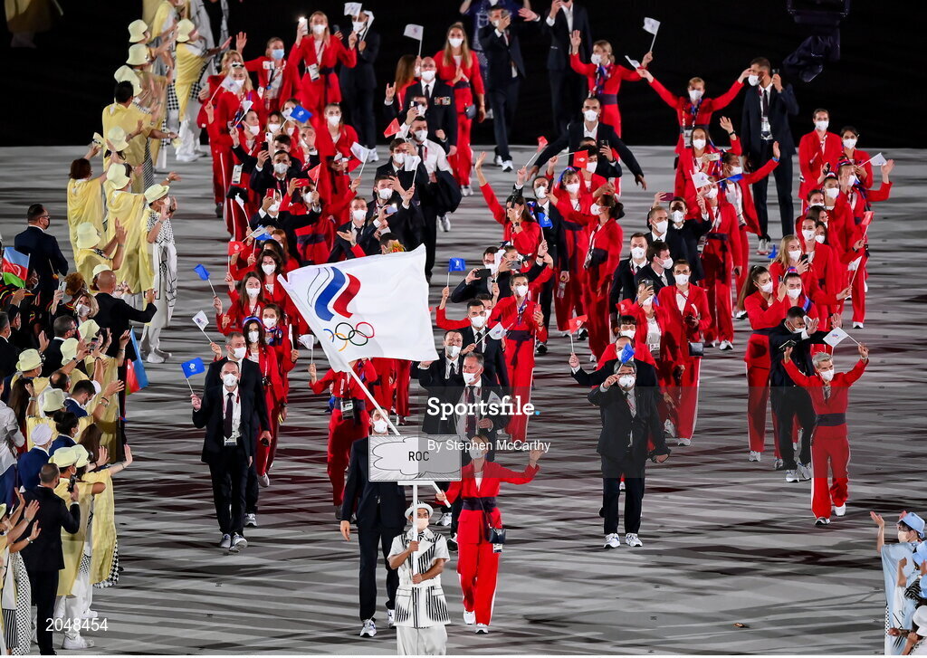 23 July 2021; Russian Olympic Committee flagbearers Sofya Velikaya and Maxim Mikhaylov carry the ROC flag during the 2020 Tokyo Summer Olympic Games opening ceremony at the Olympic Stadium in Tokyo, Japan. Photo by Stephen McCarthy/Sportsfile
