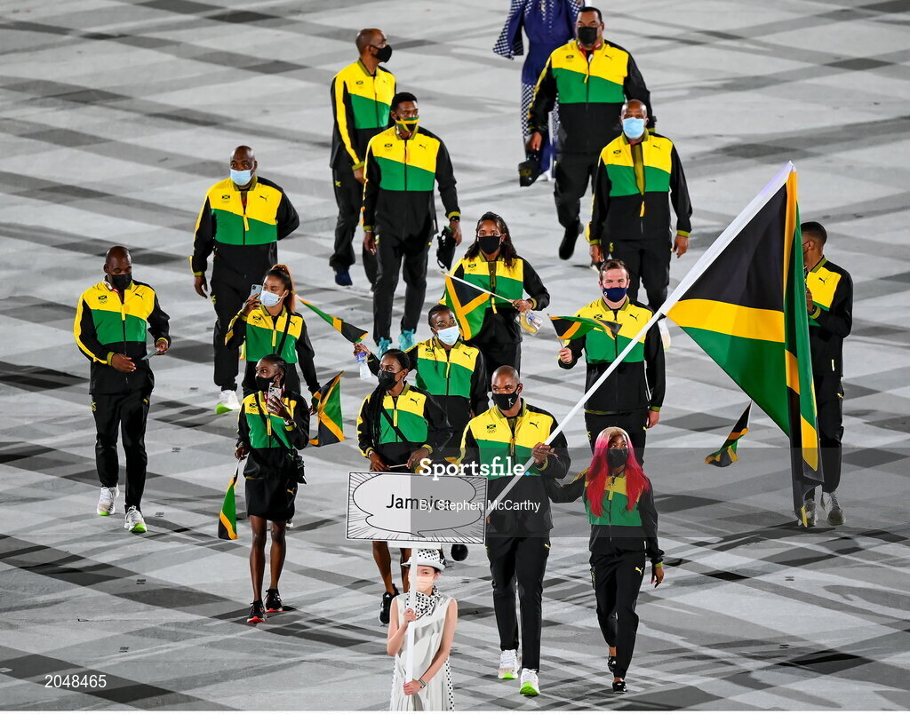 23 July 2021; Team Jamaica flagbearers Shelly-Ann Fraser-Pryce and Ricardo Brown carry the Jamaican flag during the 2020 Tokyo Summer Olympic Games opening ceremony at the Olympic Stadium in Tokyo, Japan. Photo by Stephen McCarthy/Sportsfile