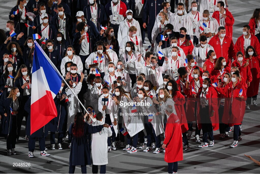 23 July 2021; France flagbearers Clarisse Agbegnou and Samir Ait Said carry the France flag during the 2020 Tokyo Summer Olympic Games opening ceremony at the Olympic Stadium in Tokyo, Japan. Photo by Stephen McCarthy/Sportsfile