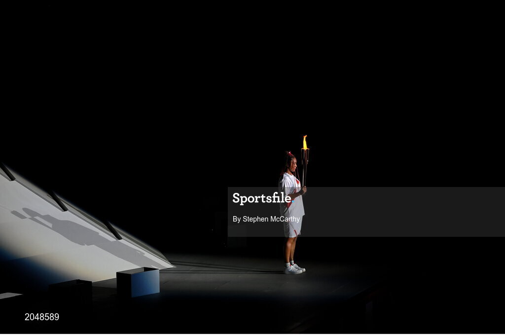 23 July 2021; Naomi Osaka of Japan with the Olympic torch before lighting the Olympic Flame during the 2020 Tokyo Summer Olympic Games opening ceremony at the Olympic Stadium in Tokyo, Japan. Photo by Stephen McCarthy/Sportsfile