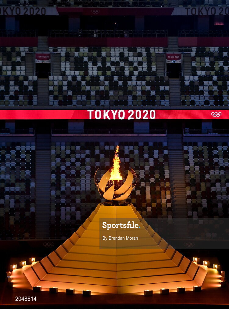 23 July 2021; The Olympic flame is lit as empty seats are seen during the 2020 Tokyo Summer Olympic Games opening ceremony at the Olympic Stadium in Tokyo, Japan. Photo by Brendan Moran/Sportsfile