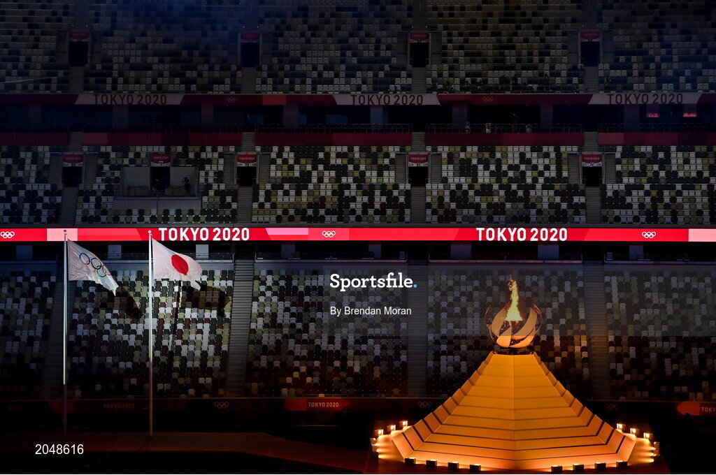 23 July 2021; The Olympic flame is lit as empty seats are seen during the 2020 Tokyo Summer Olympic Games opening ceremony at the Olympic Stadium in Tokyo, Japan. Photo by Brendan Moran/Sportsfile