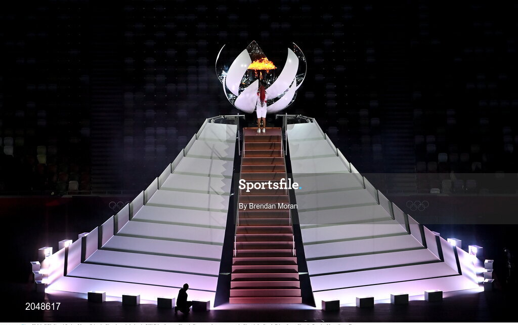 23 July 2021; Naomi Osaka of Japan lights the Olympic torch during the 2020 Tokyo Summer Olympic Games opening ceremony at the Olympic Stadium in Tokyo, Japan. Photo by Brendan Moran/Sportsfile
