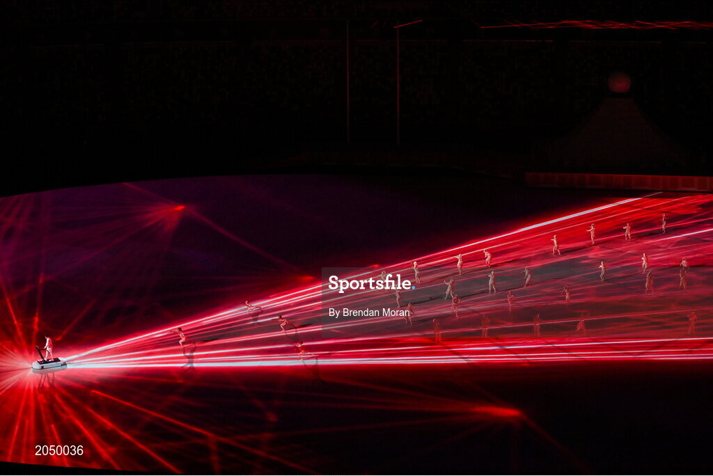 23 July 2021; A performer walks on a treadmill during the light show of the 2020 Tokyo Summer Olympic Games opening ceremony at the Olympic Stadium in Tokyo, Japan. Photo by Brendan Moran/Sportsfile