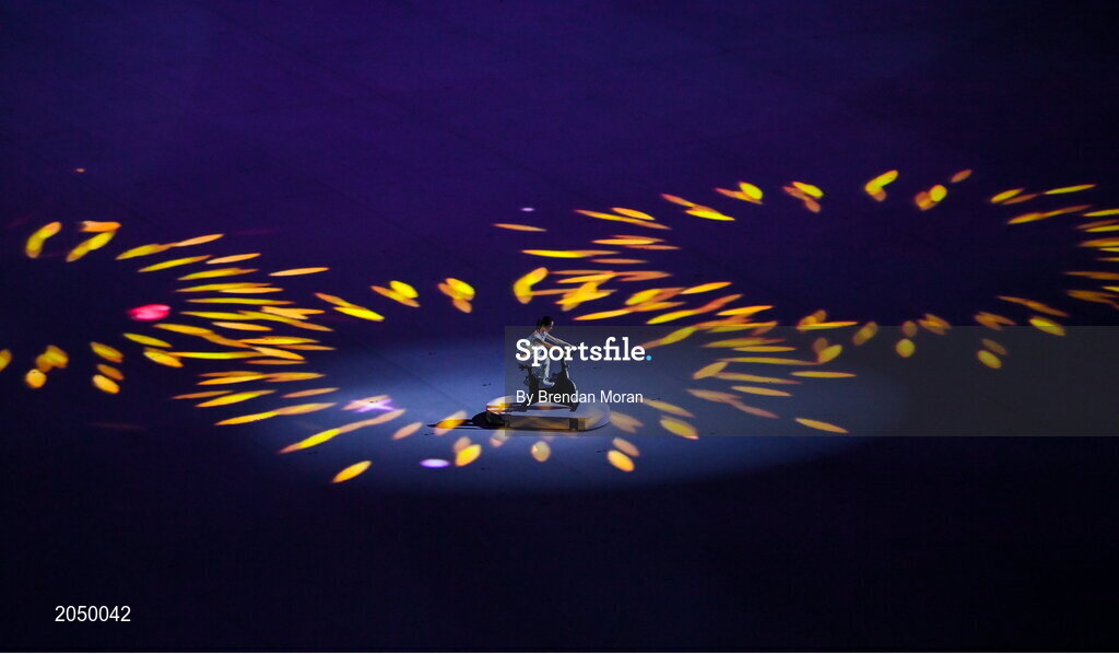23 July 2021; A performer cycles a bicycle during the light show of the 2020 Tokyo Summer Olympic Games opening ceremony at the Olympic Stadium in Tokyo, Japan. Photo by Brendan Moran/Sportsfile