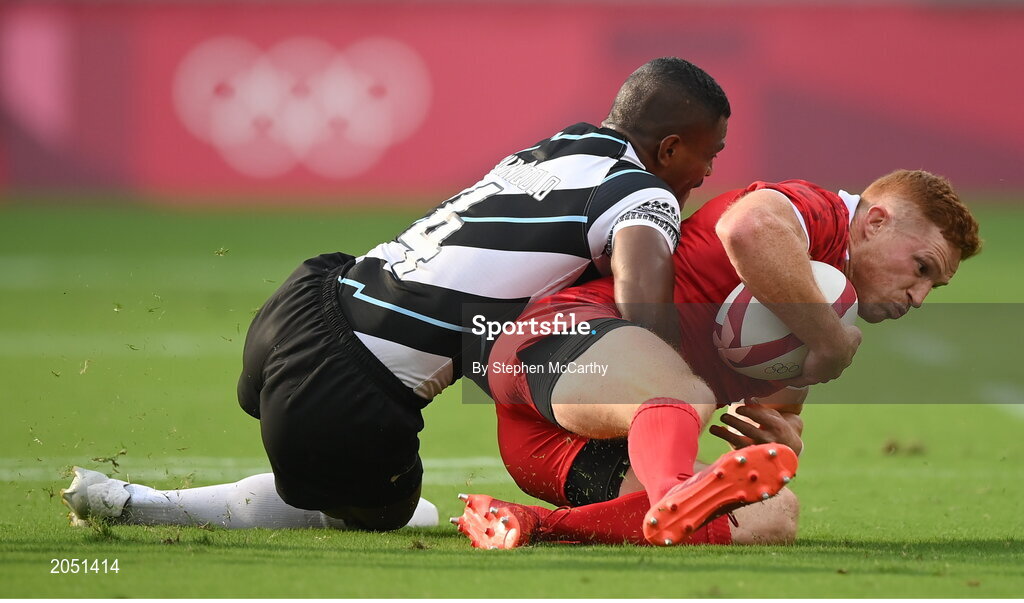26 July 2021; Connor Braid of Canada is tackled by Jiuta Wainiqolo of Fiji during the rugby sevens men's pool B match between Fiji and Canada at the Tokyo Stadium during the 2020 Tokyo Summer Olympic Games in Tokyo, Japan. Photo by Stephen McCarthy/Sportsfile