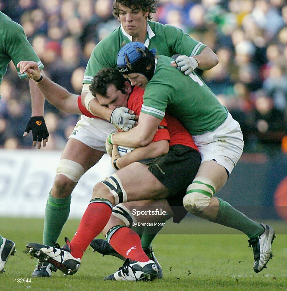 22 February 2004; Robert Sidoli, Wales, in action against Donnacha O'Callaghan and Simon Easterby, right. RBS 6 Nations Championship 2003-2004, Ireland v Wales, Lansdowne Road, Dublin. Picture credit; Brendan Moran / SPORTSFILE *EDI*
