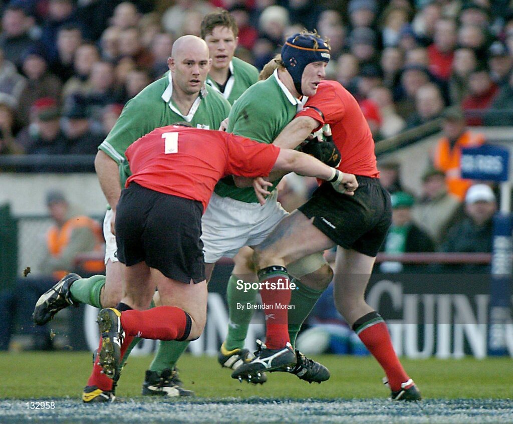 22 February 2004; Paul O'Connell, Ireland, in action against Iestyn Thomas (1) and Martyn Williams, Wales. RBS 6 Nations Championship 2003-2004, Ireland v Wales, Lansdowne Road, Dublin. Picture credit; Brendan Moran / SPORTSFILE *EDI*