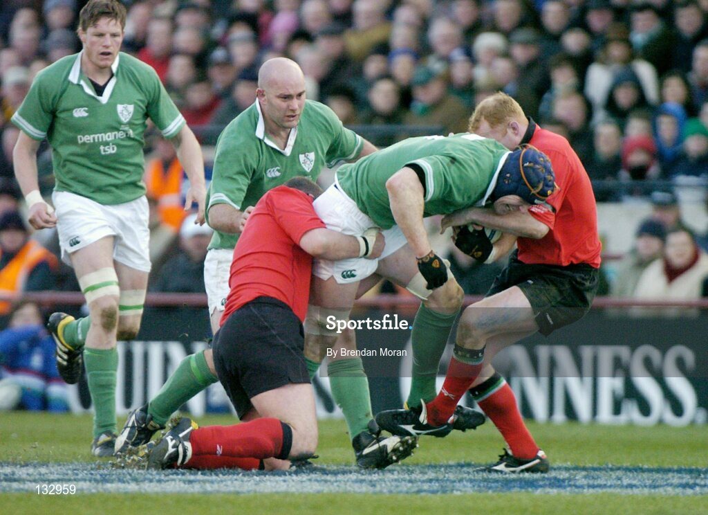 22 February 2004; Paul O'Connell, Ireland, supported by team-mates Malcolm O'Kelly, left, and John Hayes, in action against Iestyn Thomas (1) and Martyn Williams, Wales. RBS 6 Nations Championship 2003-2004, Ireland v Wales, Lansdowne Road, Dublin. Picture credit; Brendan Moran / SPORTSFILE *EDI*