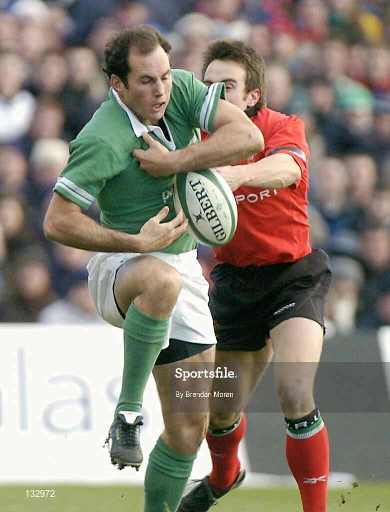 22 February 2004; Girvan Dempsey, Ireland, fumbles the ball under pressure from Shane Williams, Wales. RBS 6 Nations Championship 2003-2004, Ireland v Wales, Lansdowne Road, Dublin. Picture credit; Brendan Moran / SPORTSFILE *EDI*