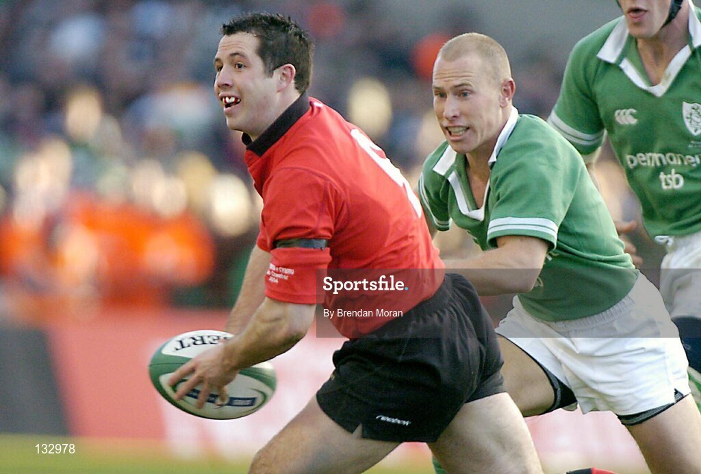 22 February 2004; Gareth Cooper, Wales, in action against Peter Stringer, Ireland. RBS 6 Nations Championship 2003-2004, Ireland v Wales, Lansdowne Road, Dublin. Picture credit; Brendan Moran / SPORTSFILE *EDI*