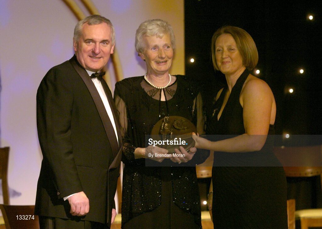 28 February 2004; Mary Sinnott Dinan, Wexford, who was named on the Camogie team of the Century, with An Taoiseach, Bertie Ahern, T.D,  and Miriam O'Callaghan, Uachtaran, Cumann Camogaiochta na nGael, at the Cumann Camogaiocht na nGael centenary celebrations at the Citywest Hotel, Dublin. Picture credit; Brendan Moran / SPORTSFILE *EDI*