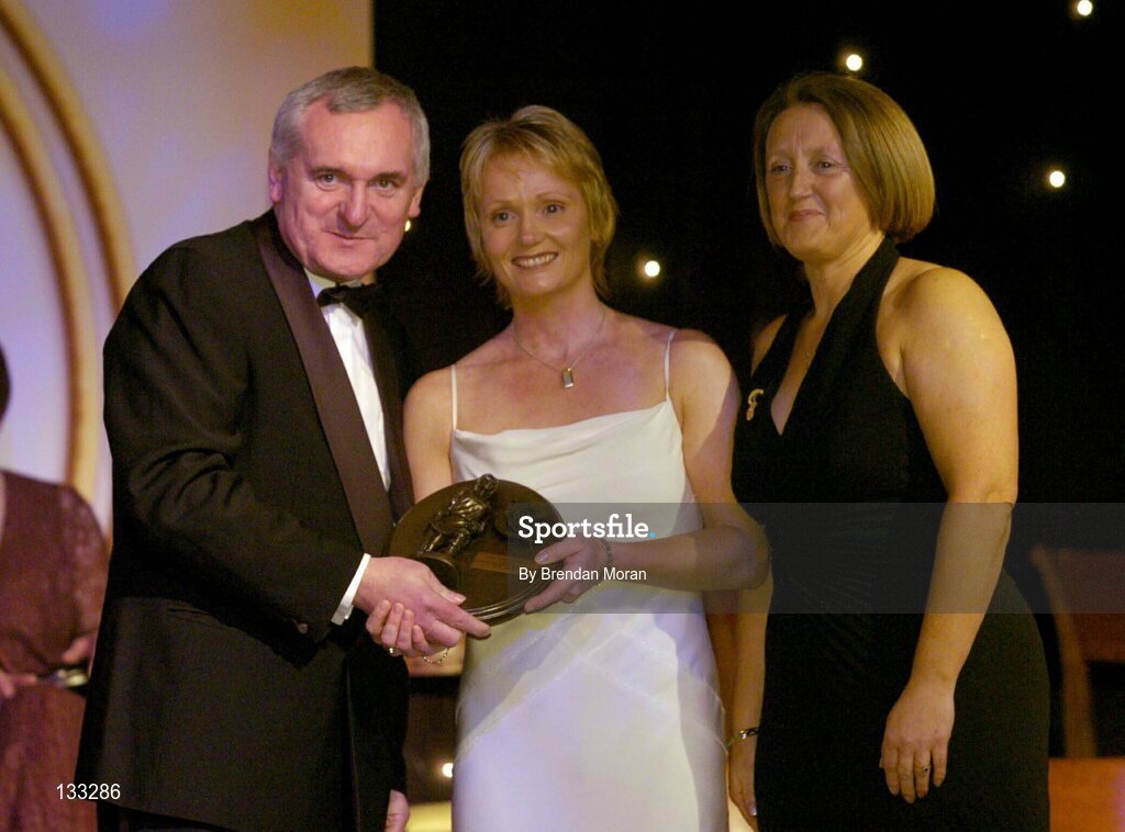 28 February 2004; Linda Mellerick, Cork, who was named on the Camogie team of the Century, with An Taoiseach, Bertie Ahern, T.D,  and Miriam O'Callaghan, Uachtaran, Cumann Camogaiochta na nGael, at the Cumann Camogaiocht na nGael centenary celebrations at the Citywest Hotel, Dublin. Picture credit; Brendan Moran / SPORTSFILE *EDI*