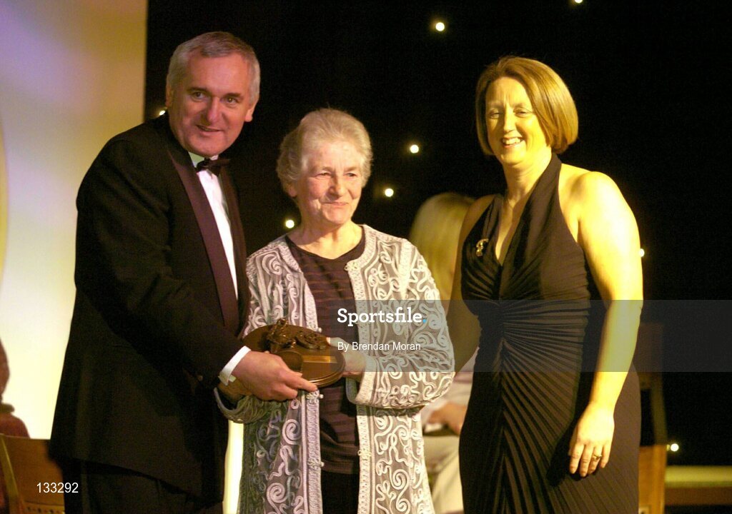 28 February 2004; Nancy McCarthy, on behalf of the late Sophie Brack, her sister, who was named on the Camogie team of the Century, with An Taoiseach, Bertie Ahern, T.D,  and Miriam O'Callaghan, Uachtaran, Cumann Camogaiochta na nGael, at the Cumann Camogaiocht na nGael centenary celebrations at the Citywest Hotel, Dublin. Picture credit; Brendan Moran / SPORTSFILE *EDI*