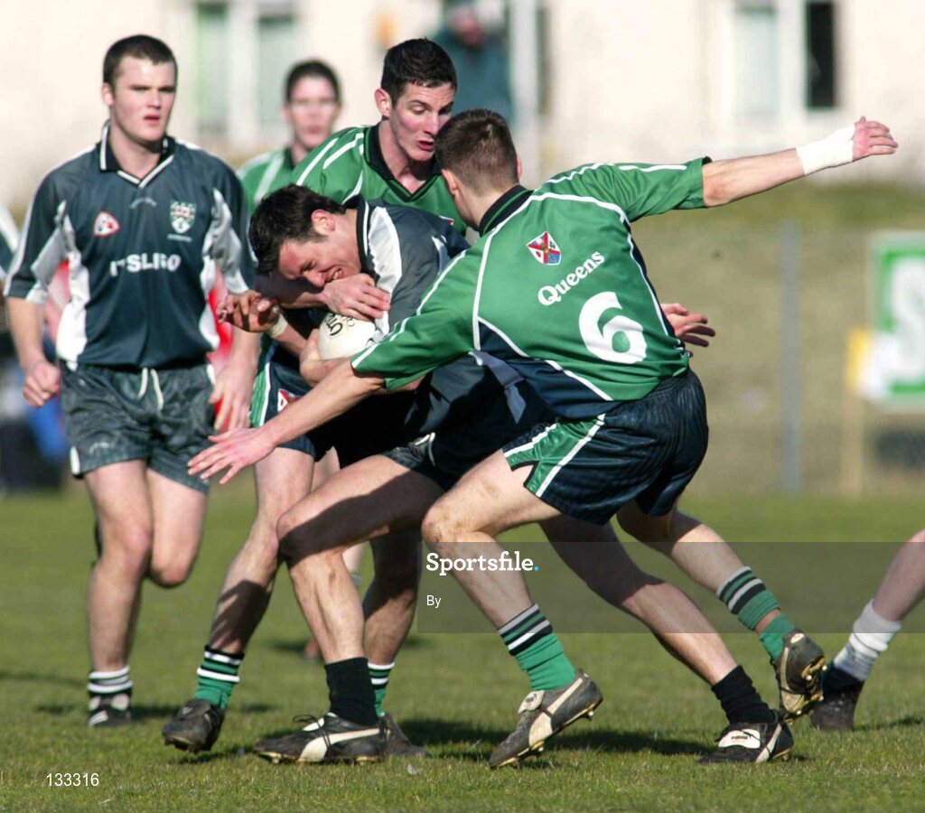 28 Ferbruary 2004; Michael Moyles, Sligo IT, in action against Aidan Fegan and Eoin Devine, Queens. Datapac Sigerson Cup Final, Queens University Belfast v Sligo IT, Corrigan Park, Belfast, Co. Antrim. Picture credit; SPORTSFILE *EDI*