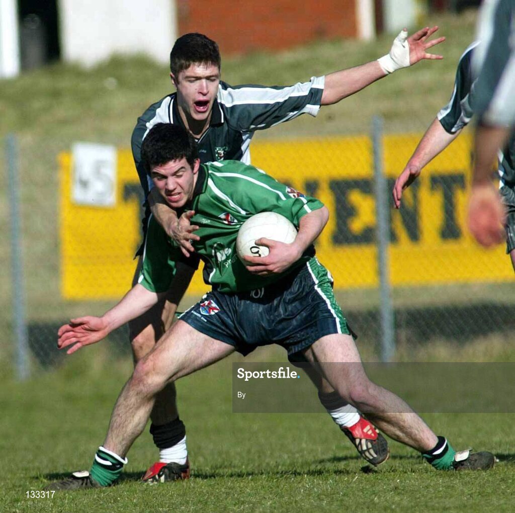 28 Ferbruary 2004; Chris Rafferty, Queens, in action against Gerard Pierson, Sligo IT. Datapac Sigerson Cup Final, Queens University Belfast v Sligo IT, Corrigan Park, Belfast, Co. Antrim. Picture credit; SPORTSFILE *EDI*