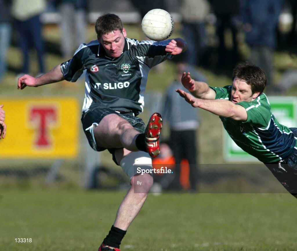 28 Ferbruary 2004; Paul Harte, Sligo IT, in action against Billy Joe Padden, Queens. Datapac Sigerson Cup Final, Queens University Belfast v Sligo IT, Corrigan Park, Belfast, Co. Antrim. Picture credit; SPORTSFILE *EDI*