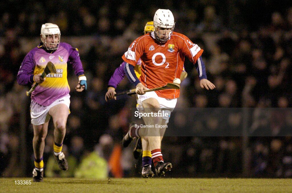 28 February 2004; Timmy McCarthy, Cork, in action against Paul Codd, left, and Mick O'Leary, Wexford. Allianz National Hurling League, Division 1B, Cork v Wexford, Pairc Ui Rinn, Cork. Picture credit; Damien Eagers / SPORTSFILE *EDI*