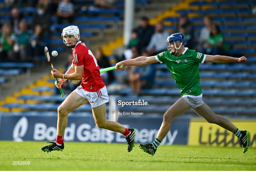 27 July 2021; Jack Leahy of Cork in action against Liam Dennehy of Limerick during the Electric Ireland Munster GAA Minor Hurling Championship Semi-Final match between Limerick and Cork at Semple Stadium in Thurles, Tipperary. Photo by Eóin Noonan/Sportsfile