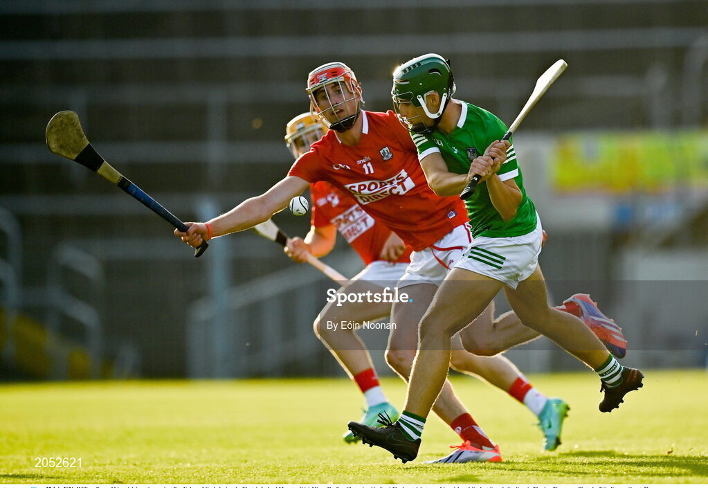 27 July 2021; William Dore of Limerick in action against Ben Nyhan of Cork during the Electric Ireland Munster GAA Minor Hurling Championship Semi-Final match between Limerick and Cork at Semple Stadium in Thurles, Tipperary. Photo by Eóin Noonan/Sportsfile