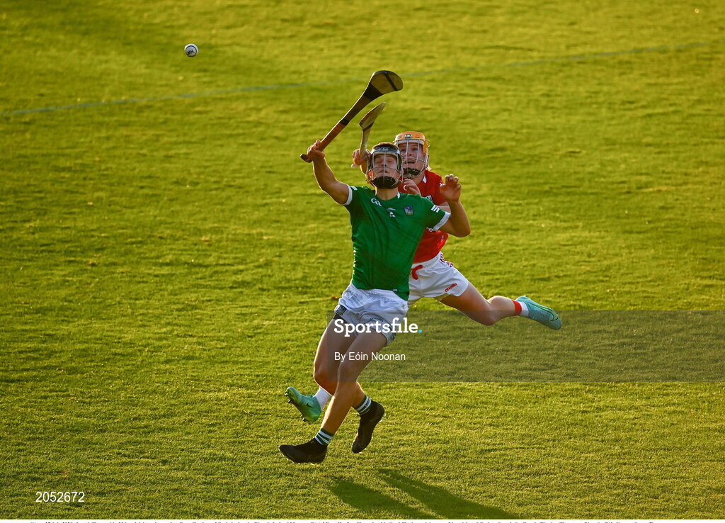 27 July 2021; Joseph Fitzgerald of Limerick in action against Rory Sheahan of Cork during the Electric Ireland Munster GAA Minor Hurling Championship Semi-Final match between Limerick and Cork at Semple Stadium in Thurles, Tipperary. Photo by Eóin Noonan/Sportsfile