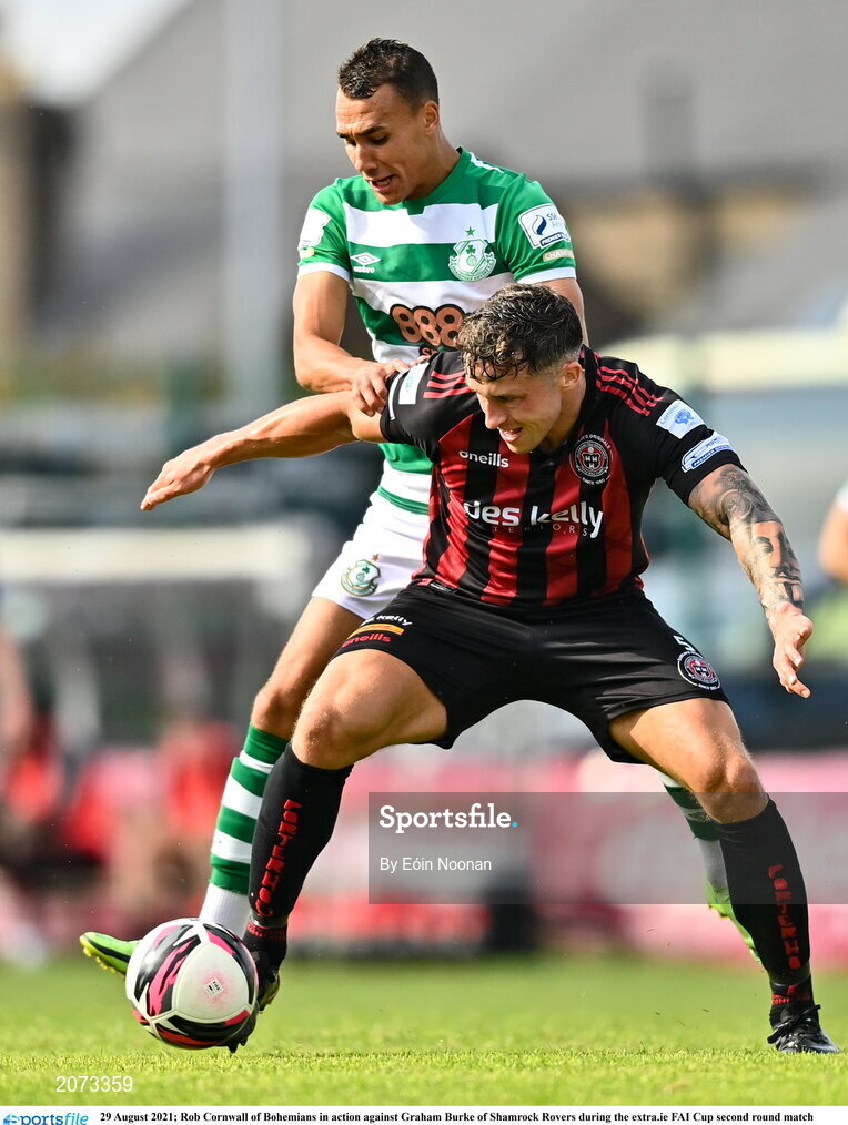 29 August 2021; Rob Cornwall of Bohemians in action against Graham Burke of Shamrock Rovers during the extra.ie FAI Cup second round match between Bohemians and Shamrock Rovers at Dalymount Park in Dublin. Photo by Eóin Noonan/Sportsfile