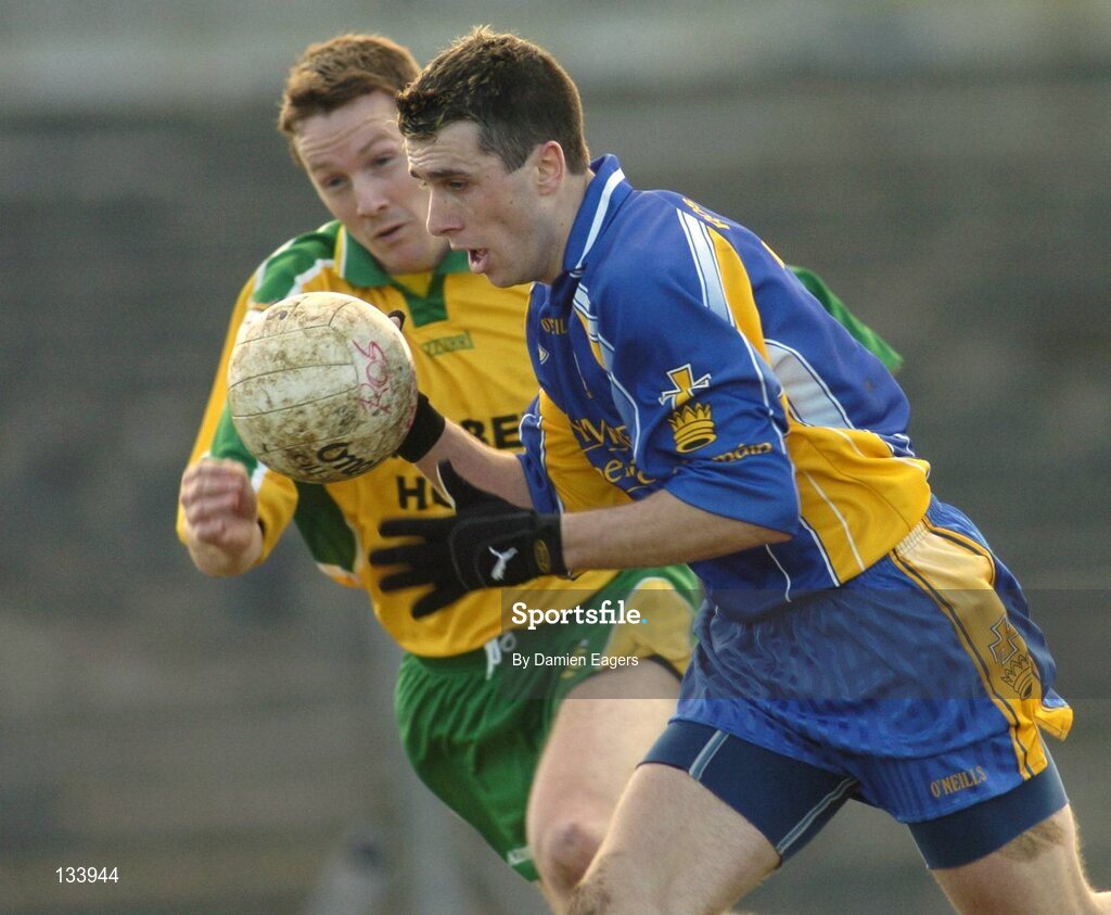 7 March 2004; John Rogers, Roscommon, in action against Raymond Sweeney, Donegal. Allianz Football League 2004, Division 2A, Round 4, Roscommon v Donegal, Dr. Hyde Park, Co. Roscommon. Picture credit; Damien Eagers / SPORTSFILE *EDI*