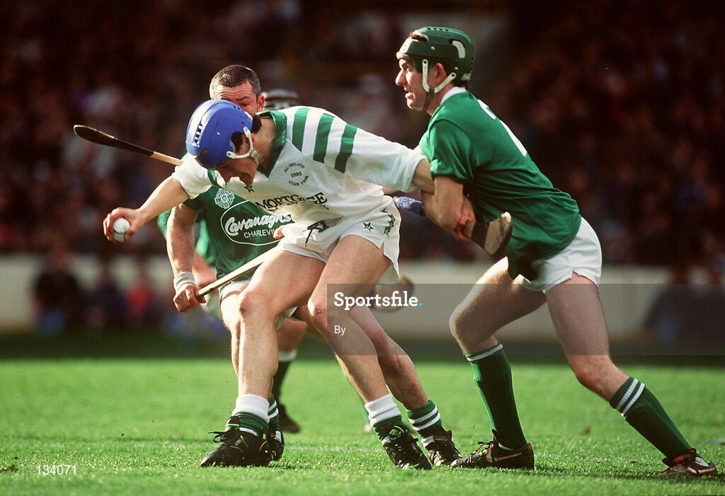 17 March 1994; Peter Cooney, Sarsfields, is tackled by Pat Meagher, right, Toomevara. AIB All - Ireland club Hurling Final, Toomevara v Sarsfields, Croke Park, Dublin. Picture credit; Ray McManus / SPORTSFILE