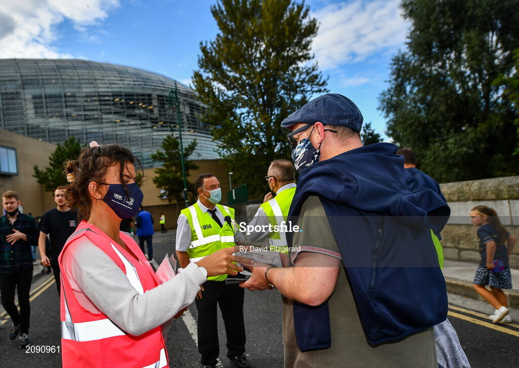 25 September 2021; Laya healthcare masks are handed out outside the stadium prior to the United Rugby Championship match between Leinster and Vodacom Bulls at Aviva Stadium in Dublin.  Photo by David Fitzgerald/Sportsfile