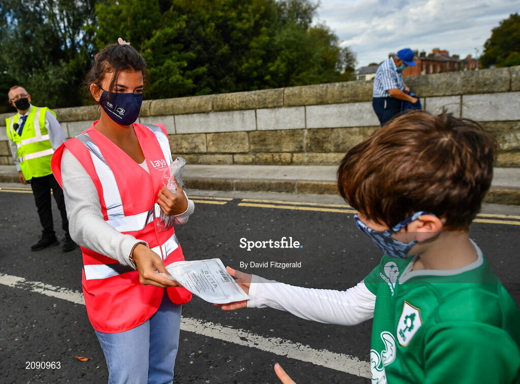 25 September 2021; Laya healthcare masks are handed out outside the stadium prior to the United Rugby Championship match between Leinster and Vodacom Bulls at Aviva Stadium in Dublin.  Photo by David Fitzgerald/Sportsfile