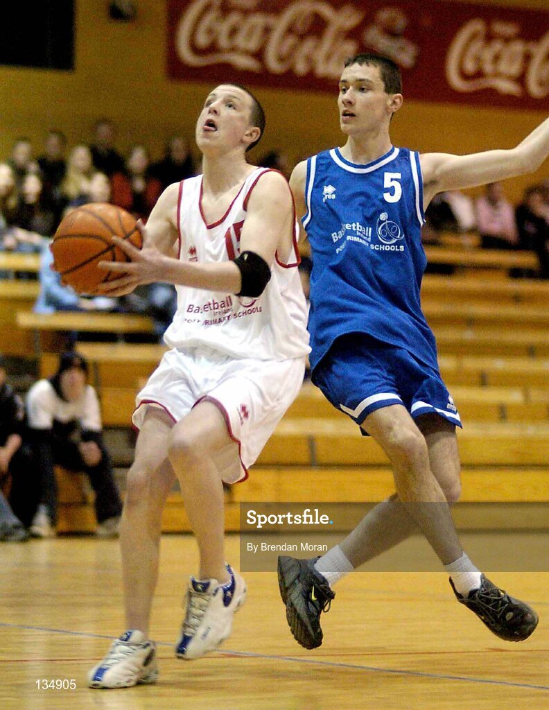 23 March 2004; Stephen Monaghan, St Pat's, Shannon, in action against Lorcan Browne, Dunshaughlin. All-Ireland Schoolboys Basketball League, U16 'C'  Final, Dunshaughlin Community College, Meath v St Pat's, Shannon, Co. Clare, ESB Arena, Tallaght, Dublin. Picture credit; Brendan Moran / SPORTSFILE *EDI*