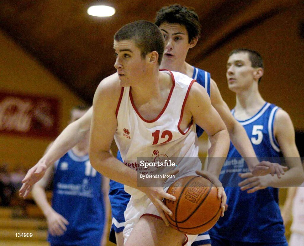 23 March 2004; Damien Power, St Pat's, Shannon, in action against Barry Guihan, Dunshaughlin. All-Ireland Schoolboys Basketball League, U16 'C'  Final, Dunshaughlin Community College, Meath v St Pat's, Shannon, Co. Clare, ESB Arena, Tallaght, Dublin. Picture credit; Brendan Moran / SPORTSFILE *EDI*