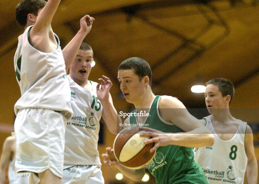 23 March 2004; Ben Honan, Ard Scoil Ris, in action against Michael Higgins, Philip Craig (15) and Thomas Mahon (8), St Nathy's. All-Ireland Schoolboys Basketball League, U16 'B'  Final, St Nathy's, Ballaghdireen,  Co. Roscommon v Ard Scoil Ris, Limerick, ESB Arena, Tallaght, Dublin. Picture credit; Brendan Moran / SPORTSFILE *EDI*
