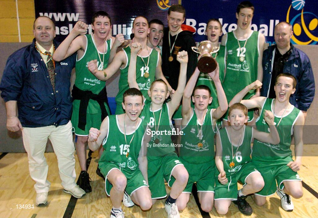 23 March 2004; The Ard Scoil Ris team, Limerick, celebrate with the cup after the game. All-Ireland Schoolboys Basketball League, U16 'B'  Final, St Nathy's Co. Roscommon v Ard Scoil Ris, Limerick, ESB Arena, Tallaght, Dublin. Picture credit; Brendan Moran / SPORTSFILE *EDI*