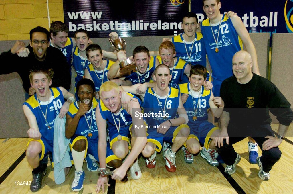 23 March 2004; The St Patrick's Comprehensive team, Shannon, celebrate with the cup after the game. All-Ireland Schoolboys Basketball League, U19 'C'  Final, St Aidan's, Cootehill, Co. Cavan v St Patrick's Comprehensive, Shannon, Co. Clare, ESB Arena, Tallaght, Dublin. Picture credit; Brendan Moran / SPORTSFILE *EDI*