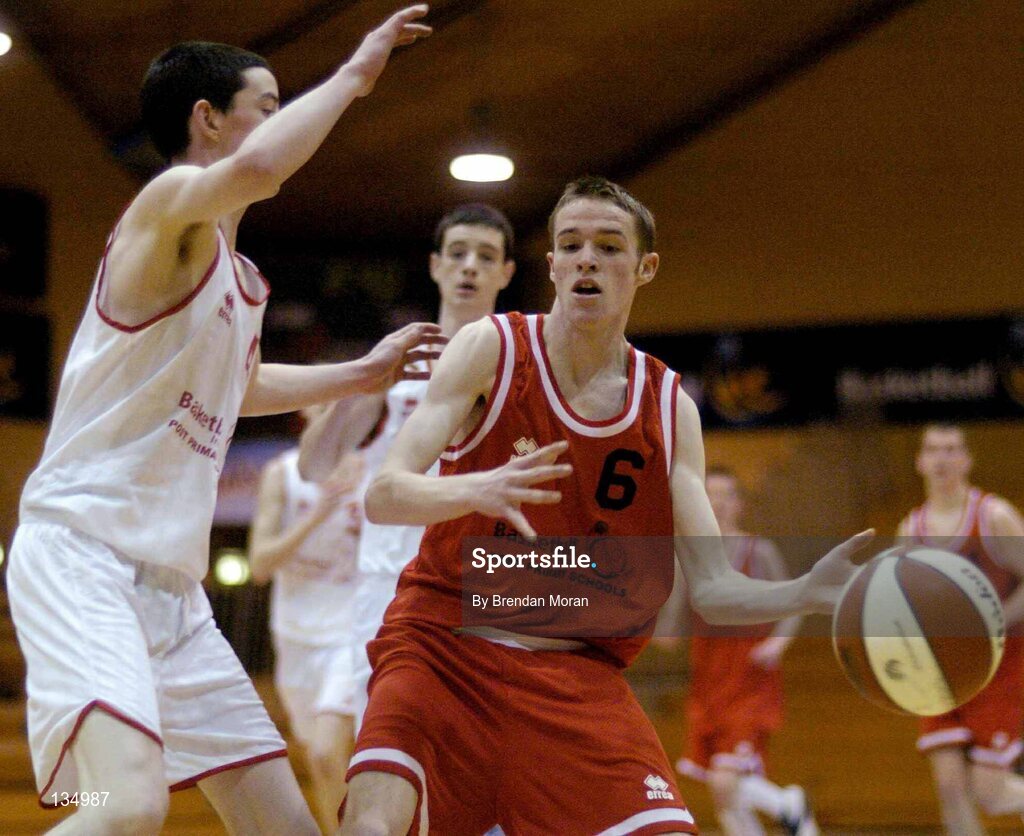 24 March 2004; Darren O'Moore, St Fintan's, in action against Cian Nihill, St Joseph's. All-Ireland Schoolboys Basketball League, U16 'A'  Final, St Joseph's Patrician College, Galway v St Fintan's, Sutton, Dublin, ESB Arena, Tallaght, Dublin. Picture credit; Brendan Moran / SPORTSFILE *EDI*